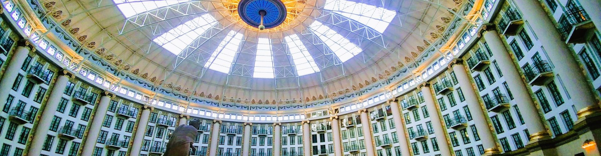 Grand hotel atrium with glass ceiling